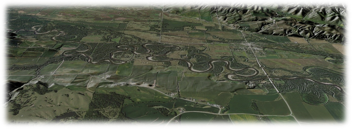 An aerial view of the Iowa River valley showing the river snaking its way through the green landscape