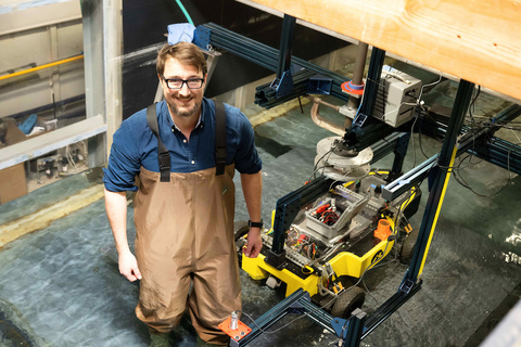 Casey Harwood in his lab