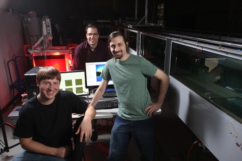 James Buchholz and students in the lab