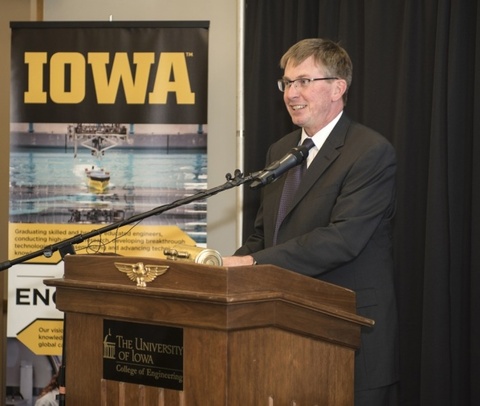 Larry Weber speaks at a podium
