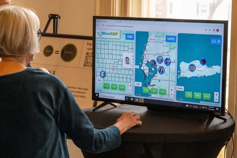 A person looking at a presentation on a computer