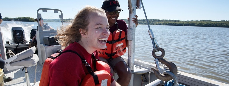 SIIHR students boating on a sunny day