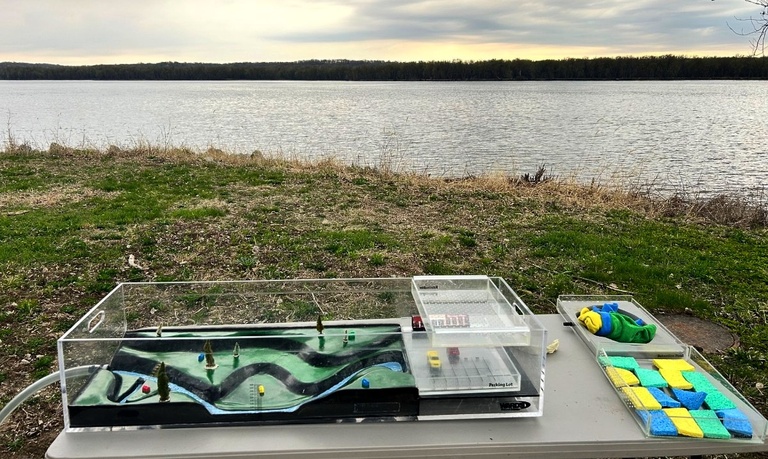 A shot of the watershed model in front of the Mississippi river