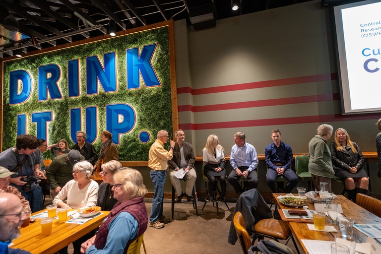 The panel of scientists chats among themselves prior to the CISWRA presentation