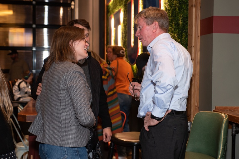 IIHR Director Larry Weber talks to members of the audience after the event. 
