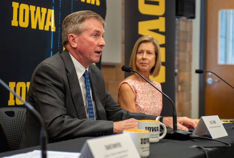 Images of press conference announcing Iowa INSIGHT. 