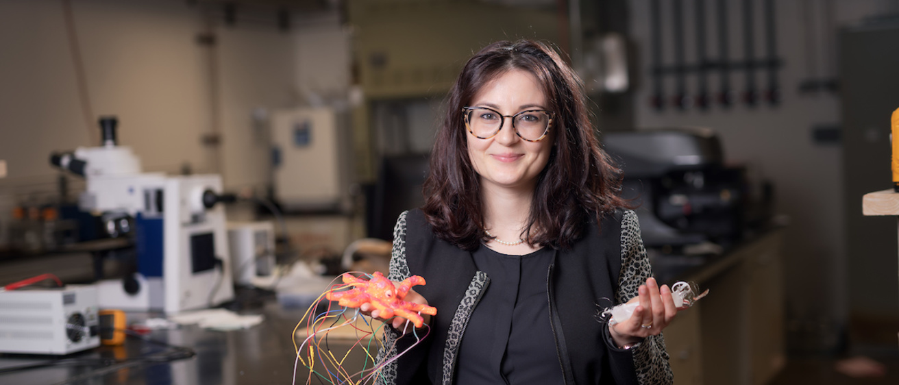 Caterina Lamuta poses with her soft robots