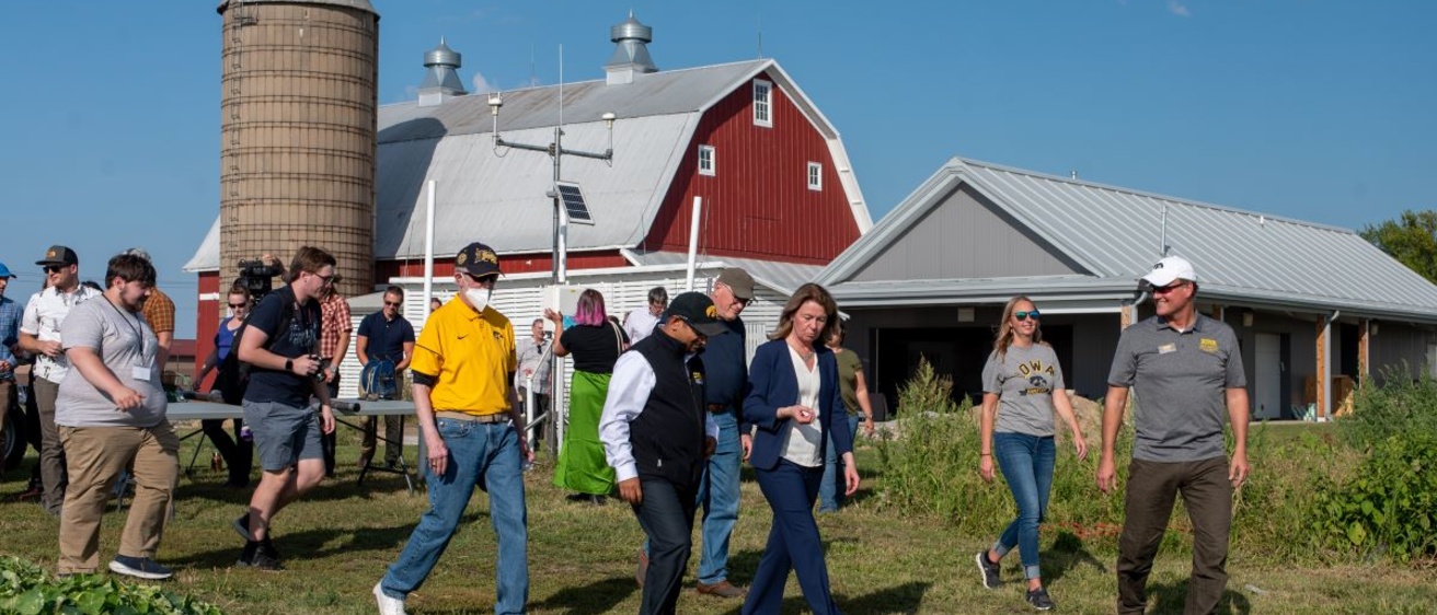 A group of people touring a farm