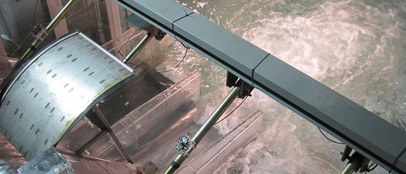 IIHR's model of the Priest Rapids Dam, shot from overhead, as water rushes through