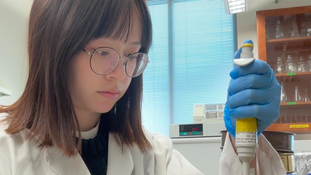Qin Dong conducting research