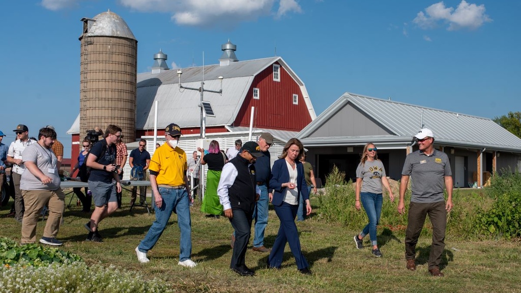 A group of people touring a farm