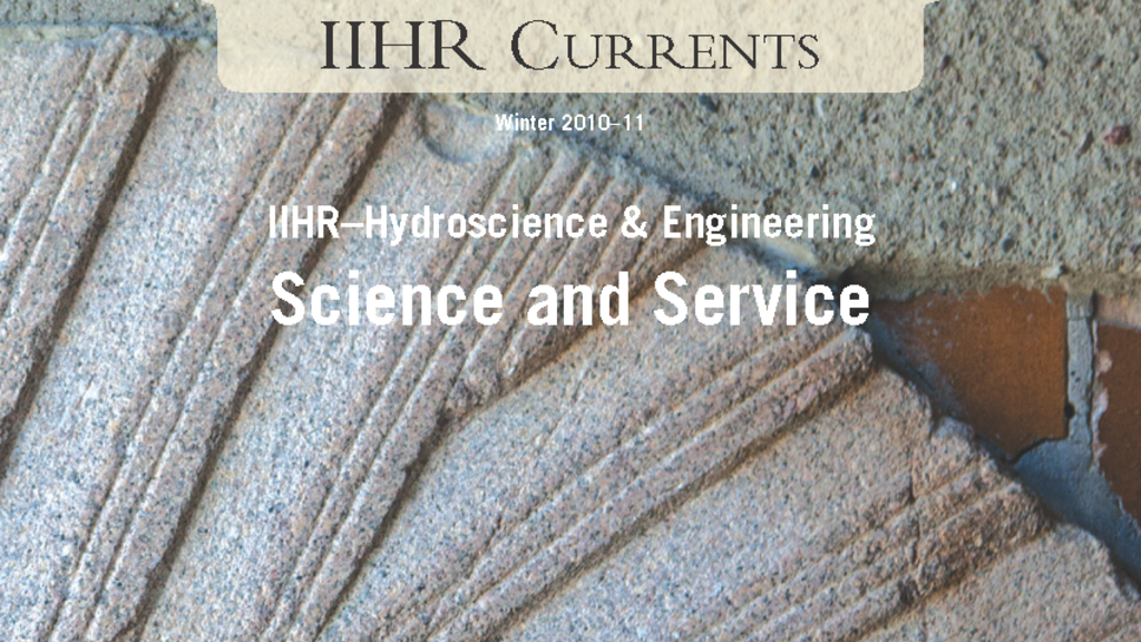Close-up photo of the historic millstone in the hydraulics lab's west entryway featured on the cover of the first issue of IIHR Currents