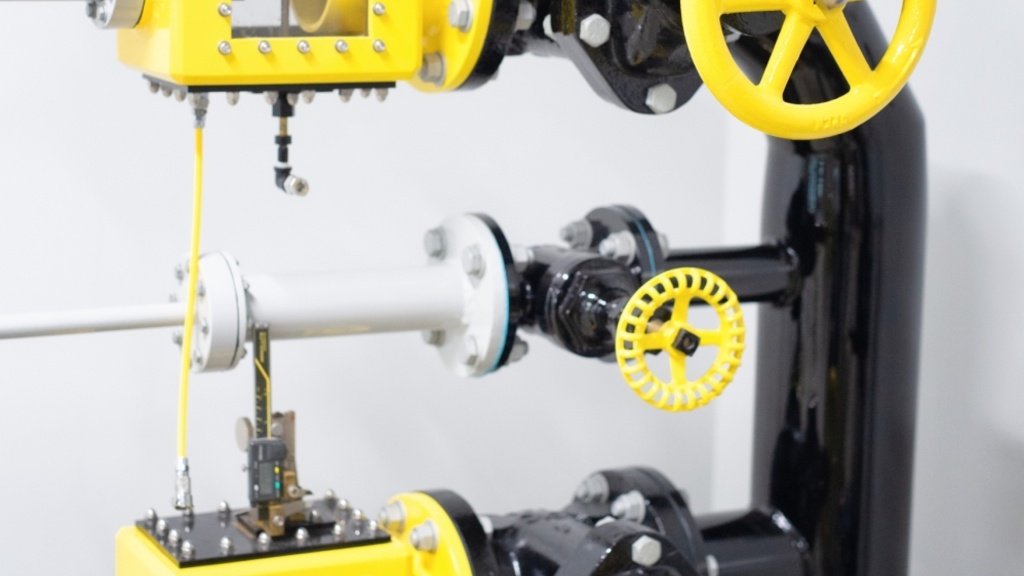 Updated pipes experiment with gold-painted valves and meters