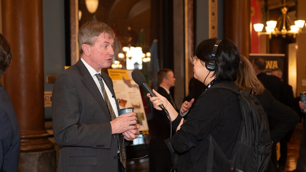 Larry Weber speaks to a Capital Dispatch interviewer at the IFC Legislative Breakfast
