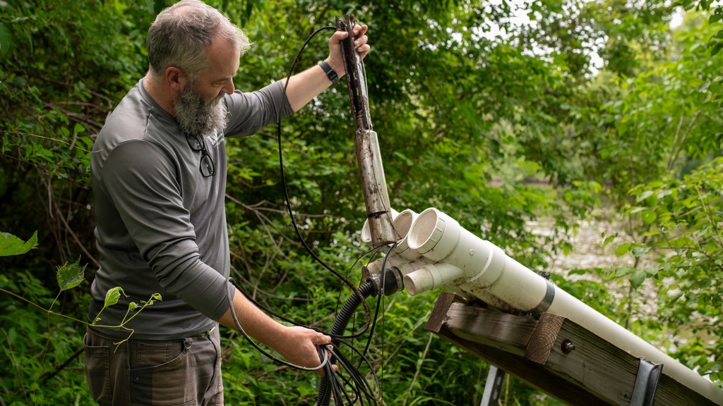 Tom Stoeffler with water quality sensor